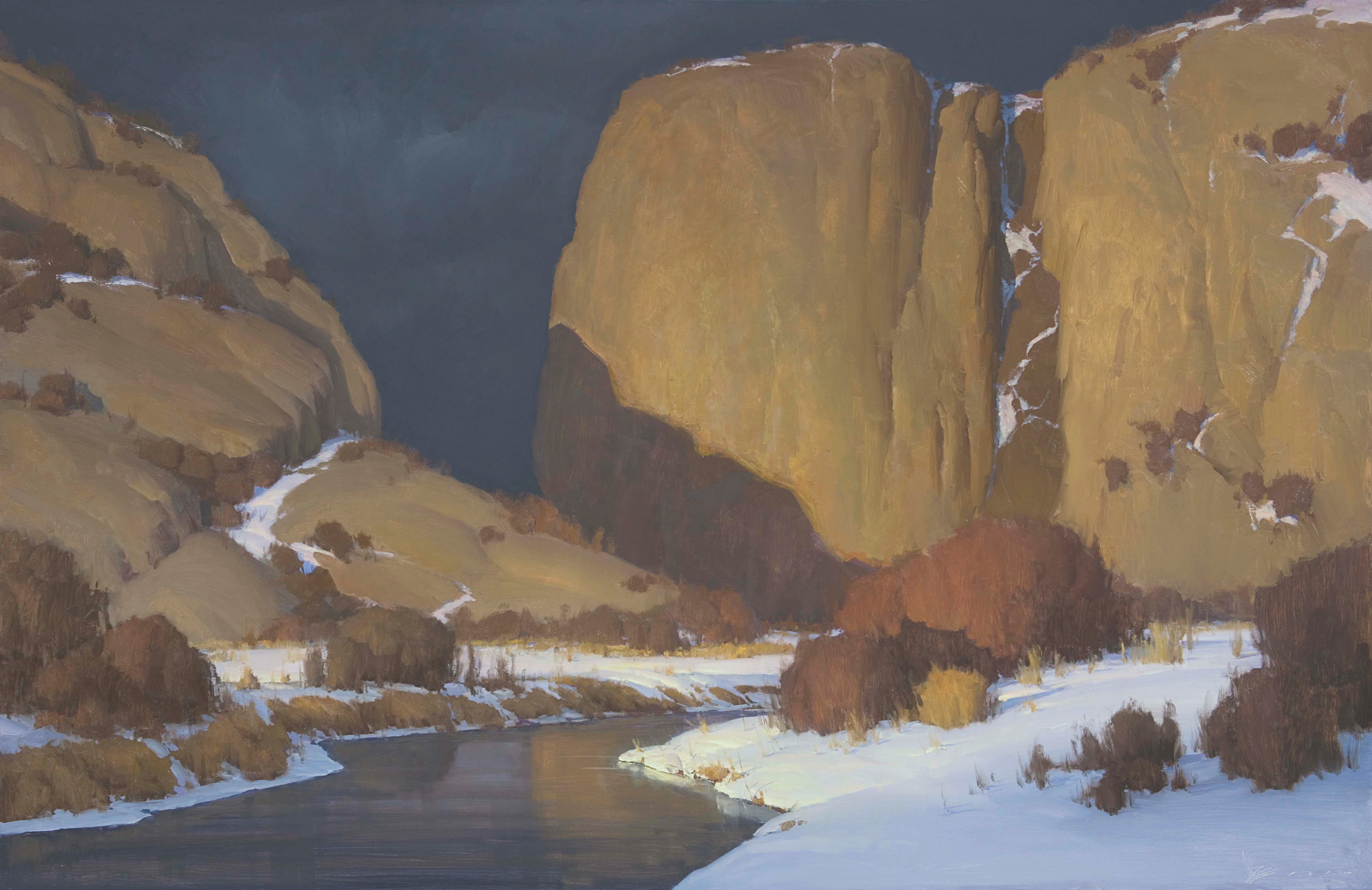 Devil's Gate in Wyoming with snow covering the ground near the Sweetwater River.
