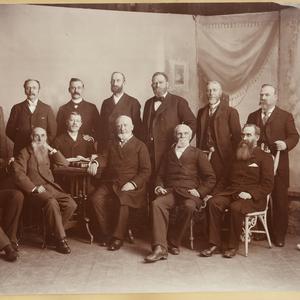Seated, left to right: Joseph M. Tanner, George Goddard, John M. Whitaker, George Q. Cannon, Karl G. Maeser, George Reynolds. Standing: Levi W. Richards, John C. Cutler, Abraham H. Cannon, Heber J. Grant, Francis M. Lyman, Thomas C. Griggs, Joseph W. Summerhays. (Church History Library, Salt Lake City. Photograph by Charles R. Savage.)