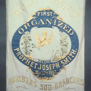 The Central Board of the Relief Society rode in carriages behind this white silk banner for the Jubilee Pioneer Day celebration in Salt Lake City in 1880. (Church History Museum, Salt Lake City.)
