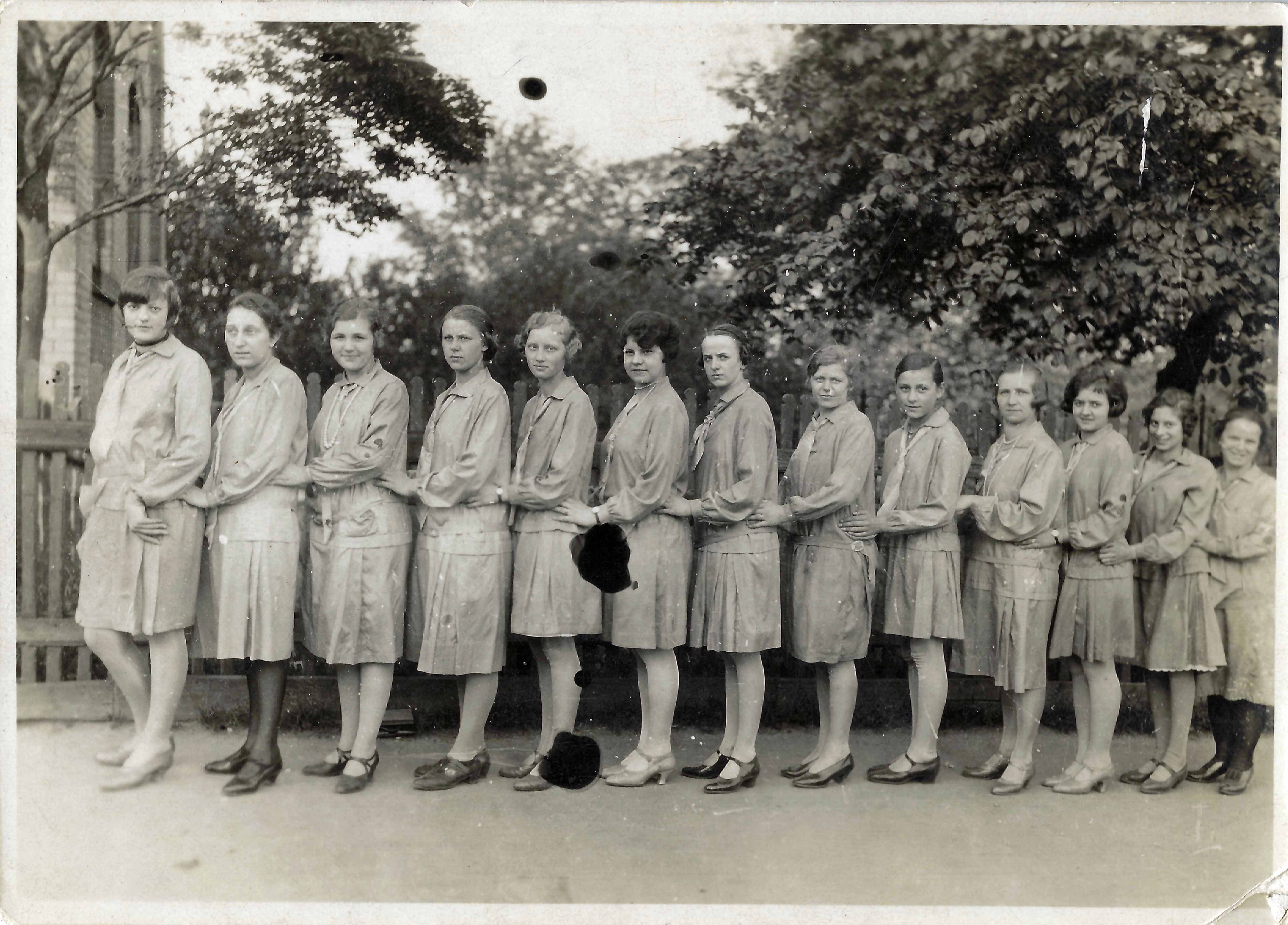 <strong>Bee-Hive Girls of the Zwickau Branch.</strong> 1924. In Germany, the Zwickauer Bienenkorbmädchen, or Bee-Hive Girls of the Zwickau Branch, developed a robust program during the 1920s and 1930s, including these matching uniforms with beehive insignia. Several young women kept their Bee-Hive Girls scrapbooks among the few treasured possessions they brought when immigrating to new lands. (Image courtesy Glenn Fassmann.)