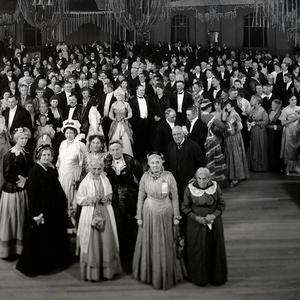 Emmeline B. Wells (front row, left, wearing a long white shawl) was among a group of early pioneers honored on 25 February 1916 at an event held at the Odeon Dance Hall in Salt Lake City. Photograph by the Wiggins studio. (PH 2159, Church History Library, Salt Lake City.)