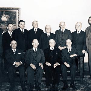 Seated, left to right: Stephen L Richards, Joseph Fielding Smith, George F. Richards, George Albert Smith. Standing: Ezra Taft Benson, Spencer W. Kimball, Harold B. Lee, Albert E. Bowen, Charles A. Callis, Joseph F. Merrill, John A. Widtsoe, Richard R. Lyman. (Church History Library, Salt Lake City.)