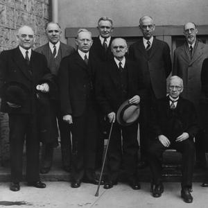 Standing, left to right: George F. Richards, Joseph F. Merrill, Joseph Fielding Smith, David O. McKay, James E. Talmage, Reed Smoot, George Albert Smith, Stephen L Richards, Richard R. Lyman, Melvin J. Ballard. Seated: Rudger Clawson. (Church History Library, Salt Lake City.)