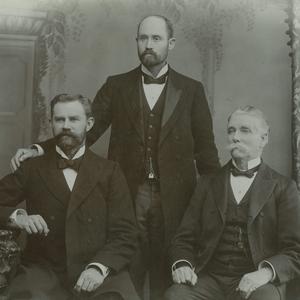 President Platte D. Lyman of the British Mission is flanked by his counselors, James L. McMurrin (left) and Henry W. Naisbitt, circa 1900. Photo taken by the studio of E. Hinchcliffe, Liverpool. (PH 5643, Church History Library, Salt Lake City.)