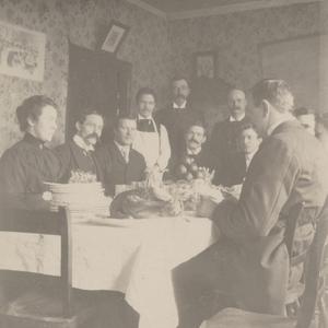 Missionaries celebrate George Washington’s birthday at 36 Penton Street, London, 22 February 1899: Eliza Chipman (left), John R. Hindley, Richard H. Hamblin, William C. Wright, Walter J. Knell, [first name unknown] Miles, Jabez W. West, [first name not given] Horsley, Frank L. Layton, Inez Knight, Raymond Knight. On the back of the photograph, Chipman noted humorously, “The turkey represents J. [Joseph] R. Squires on the picture and he represented the turkey in reality—or out of the picture.” (MS 29199, Church History Library, Salt Lake City.)
