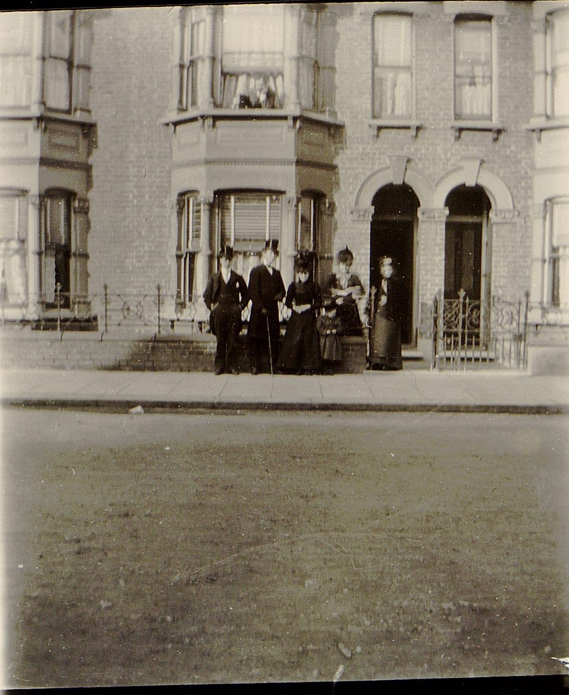 Missionaries stand outside Inez Knight and Eliza Chipman’s apartment, 12 Dunbar Road, London, circa March 1899. (MS 29199, Church History Library, Salt Lake City.)