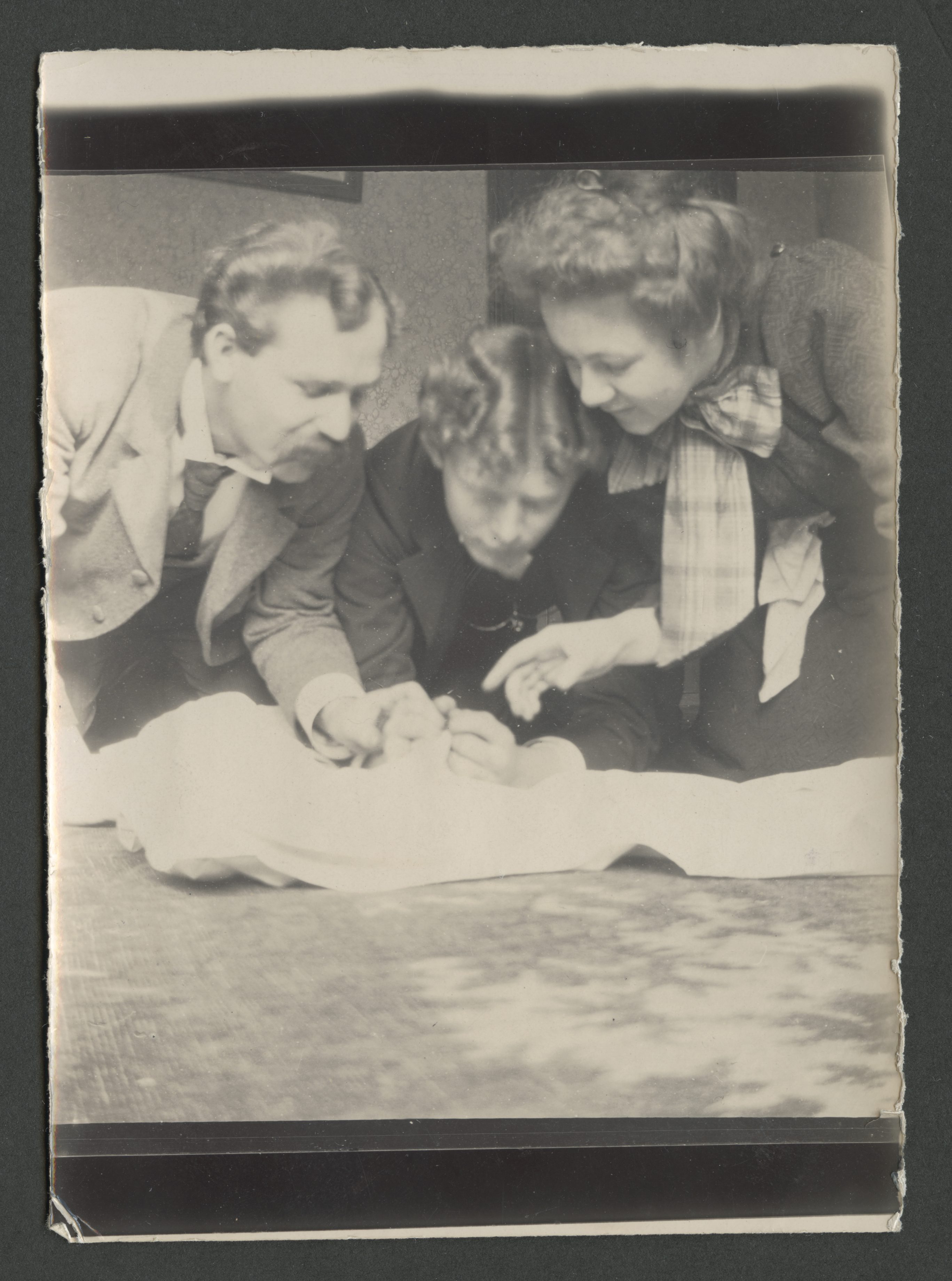 John R. Hindley (left), Joseph R. Squires, and Eliza Chipman look for fleas after shaking them off their clothing onto a sheet, circa 1898. Chipman and her missionary companion Josephine Booth remarked often on their struggles with the tiny parasites. In her journal entry of 2 September 1899, Booth observed darkly that the famed explorer Sir Henry Morton Stanley would “never know what ‘diligent hunting’ is till he hunts fleas.” (MS 29199, Church History Library, Salt Lake City.)