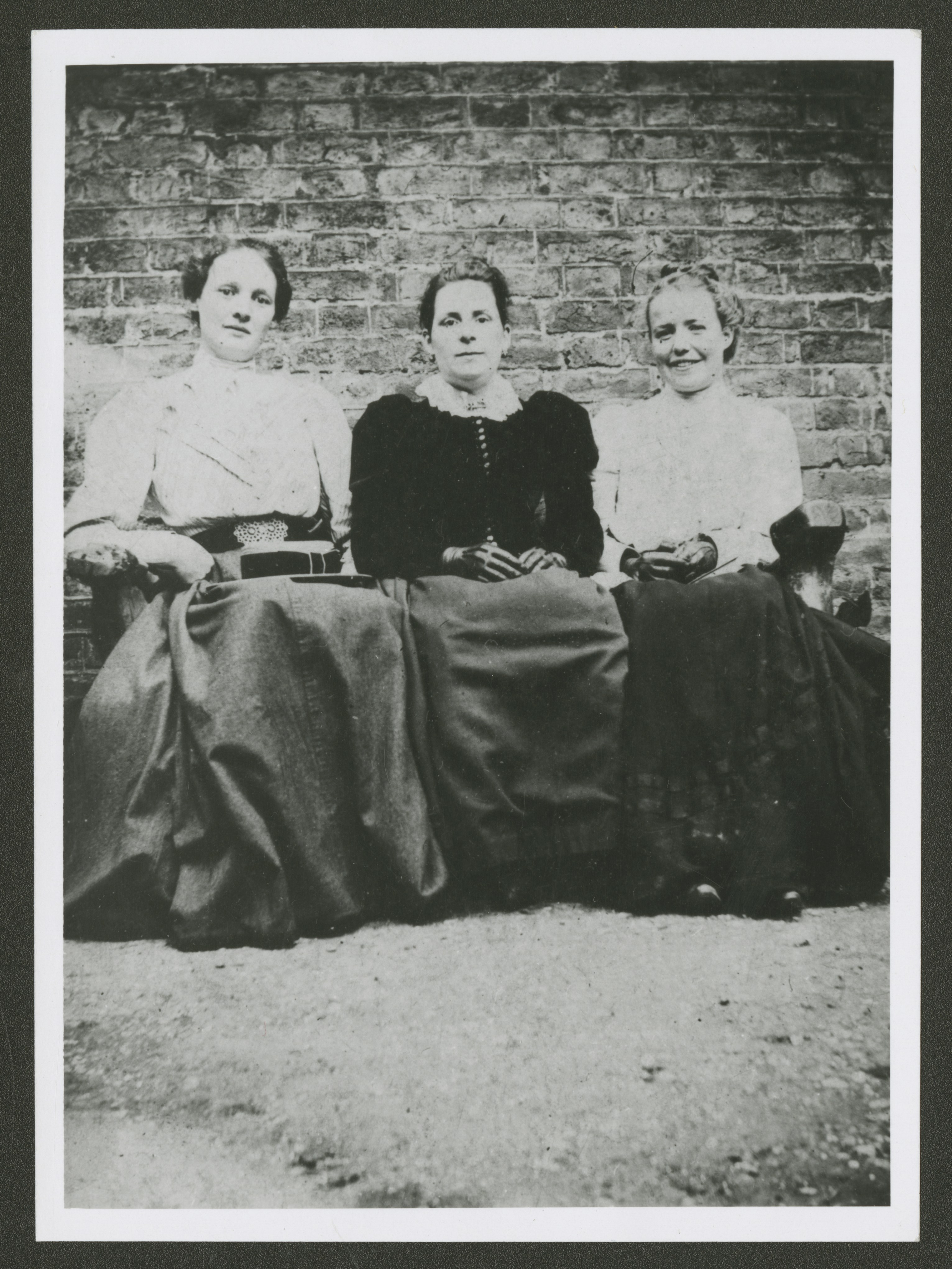 Missionaries Josephine Booth (left) and Clara Holbrook (right) pose with a local Latter-day Saint, Sister Crudgington, in the Forest Hill neighborhood of London, circa July 1899. Photograph taken by Brother Pendry of Forest Hill. (PH 6142, Church History Library, Salt Lake City.)