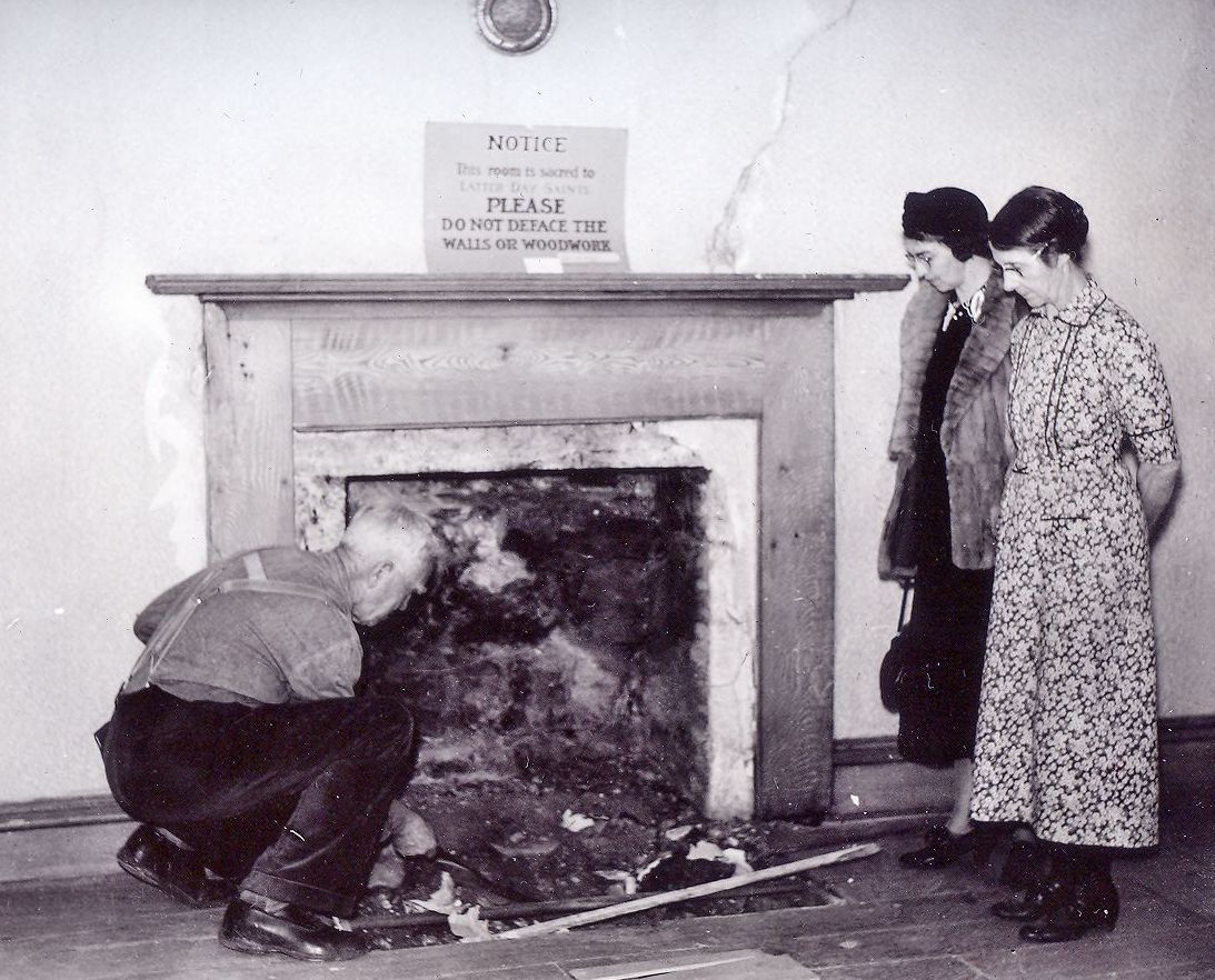 Elder Joseph McRae working on the fireplace at the Carthage Jail
