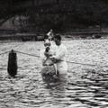 Elder Nanno Elzinga performing baptism, Central States Mission
